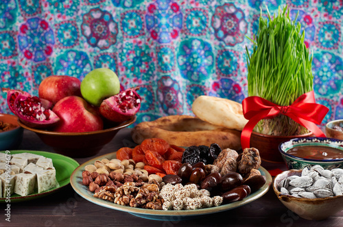 Traditional Azerbaijan sweet cuisine of holiday Nowruz. Fresh green grass samani symbol of spring