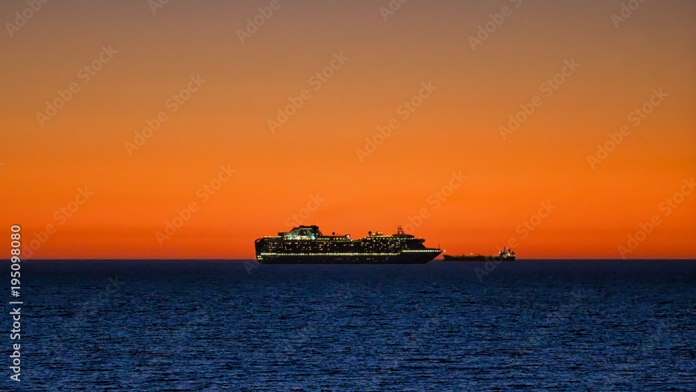 Sunset Cruise Ship at Cottesloe Beach during summer