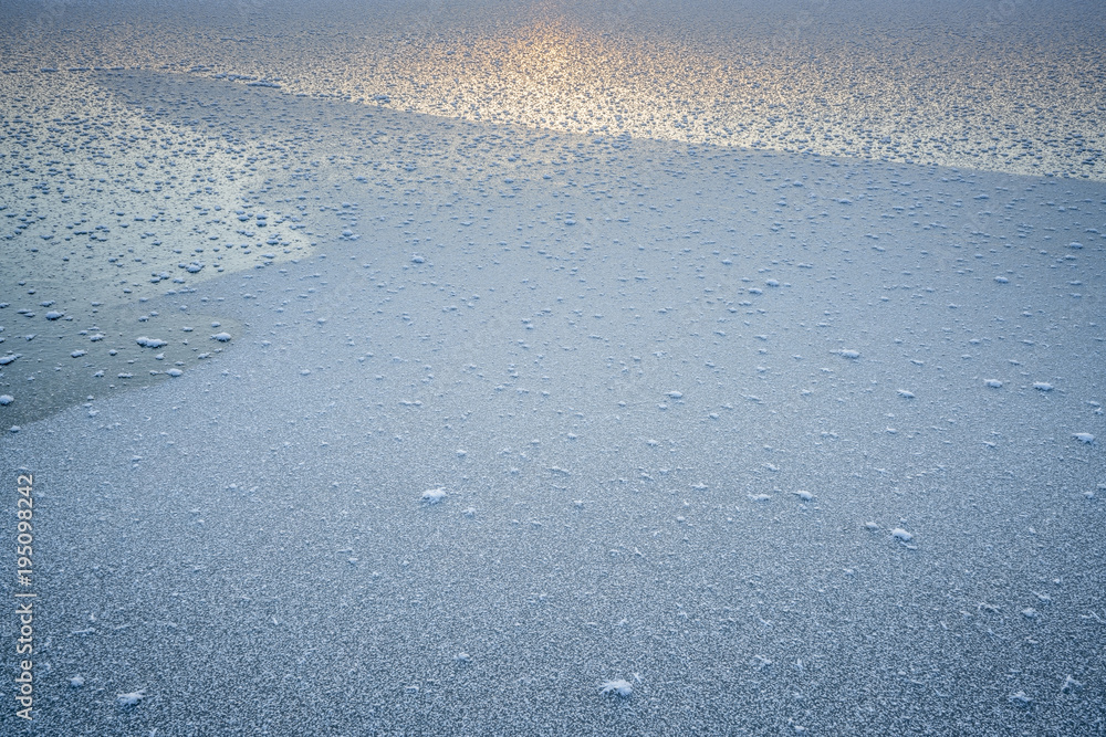ice crystals on a frozen lake ice crystals on a frozen lake
