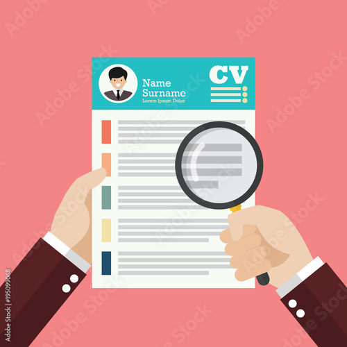 Hand holding magnifying glass over Curriculum Vitae