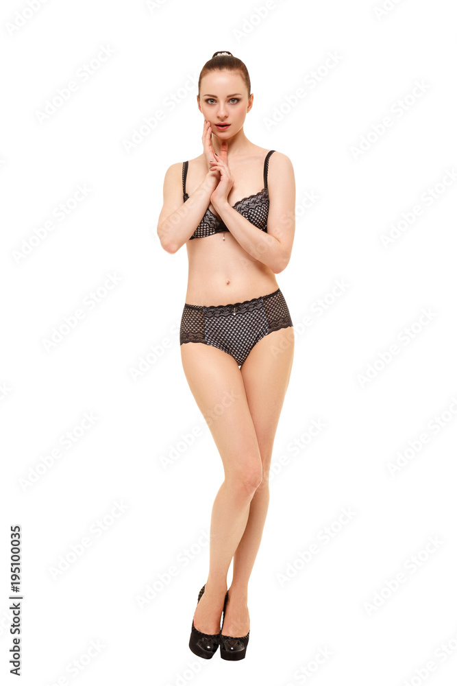 Confused girl in lingerie on white background Confused girl in lingerie on white background