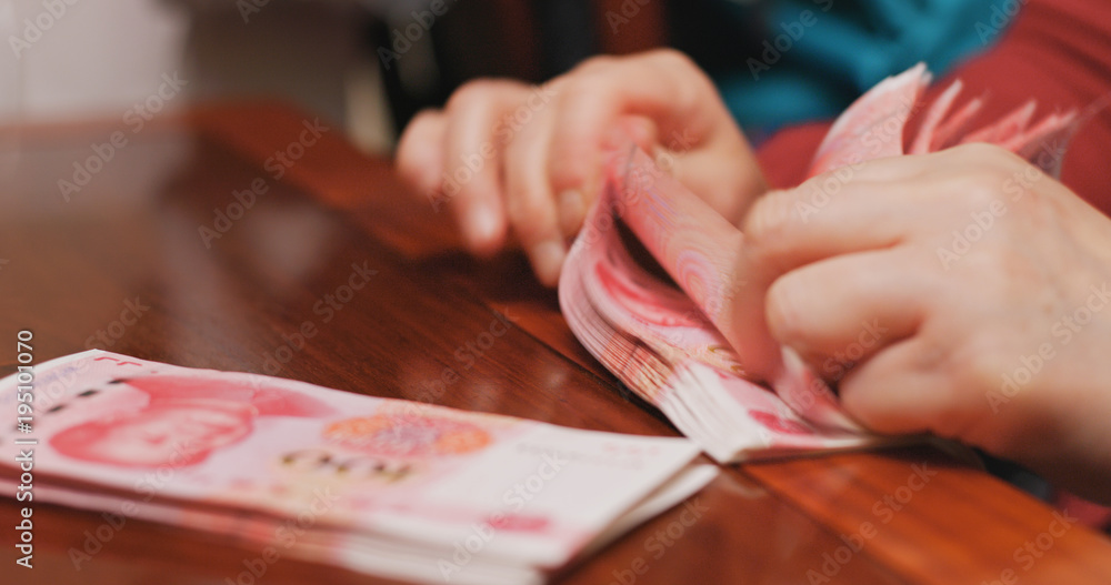 Counting RMB by hand Counting RMB by hand