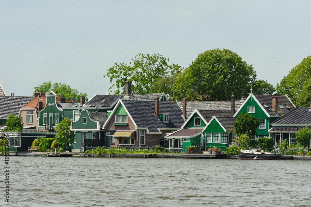 Traditional dutch houses near the canal in summer day. Netherlands Traditional dutch houses near the canal in summer day. Netherlands