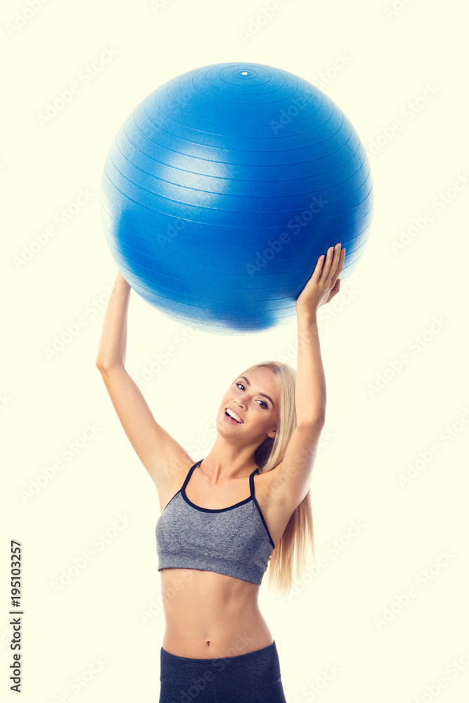 Young smiling woman in sportswear with fitball Young smiling woman in sportswear with fitball