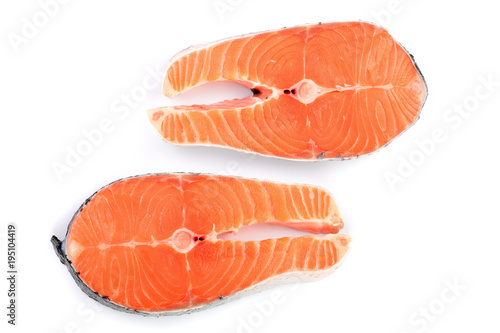 Slice of red fish salmon isolated on white background. Top view. Flat lay