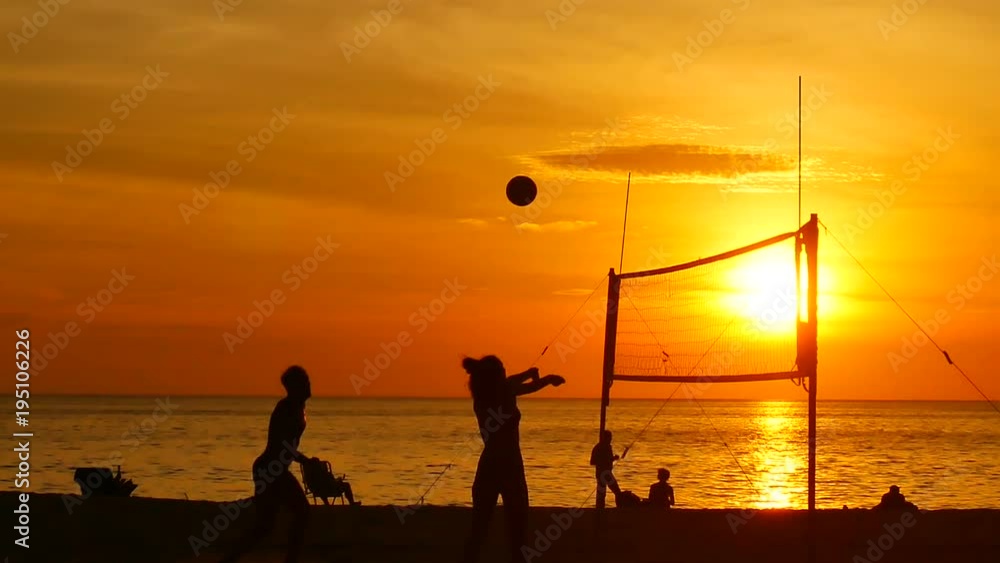 custom made wallpaper toronto digitalSlow Motion Video silhouette group of  person playing volleyball on the beach at sunset time with sunlight in sport and lifestyle concept.