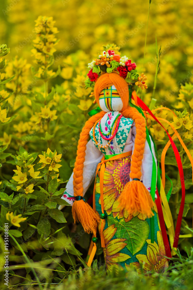 Fototapeta premium Ukrainian doll-motanka or rag doll. Stuffed Toys. Handmade texti