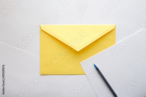 envelope paper and pen are waiting for writing and sending