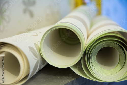Three rolls of vinyl wallpaper for room repair