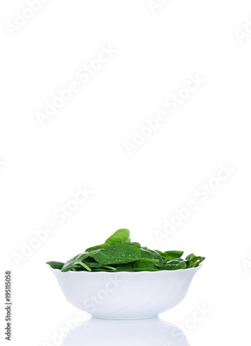 Green fresh spinach in plate