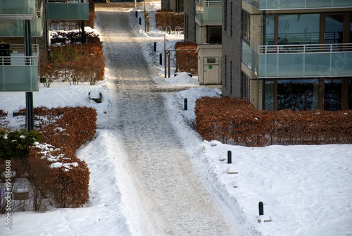 Photography A street between the houses in winter in Oslo, Norway