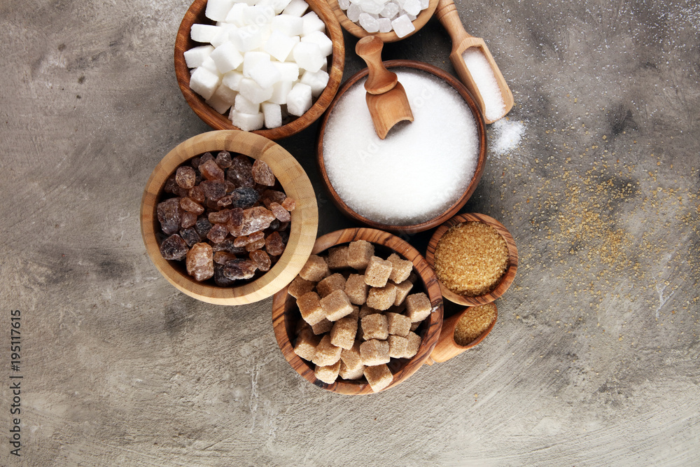 Fototapeta premium Various types of sugar, brown sugar and white on table
