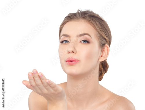 Young beautiful woman face portrait with healthy skin.
