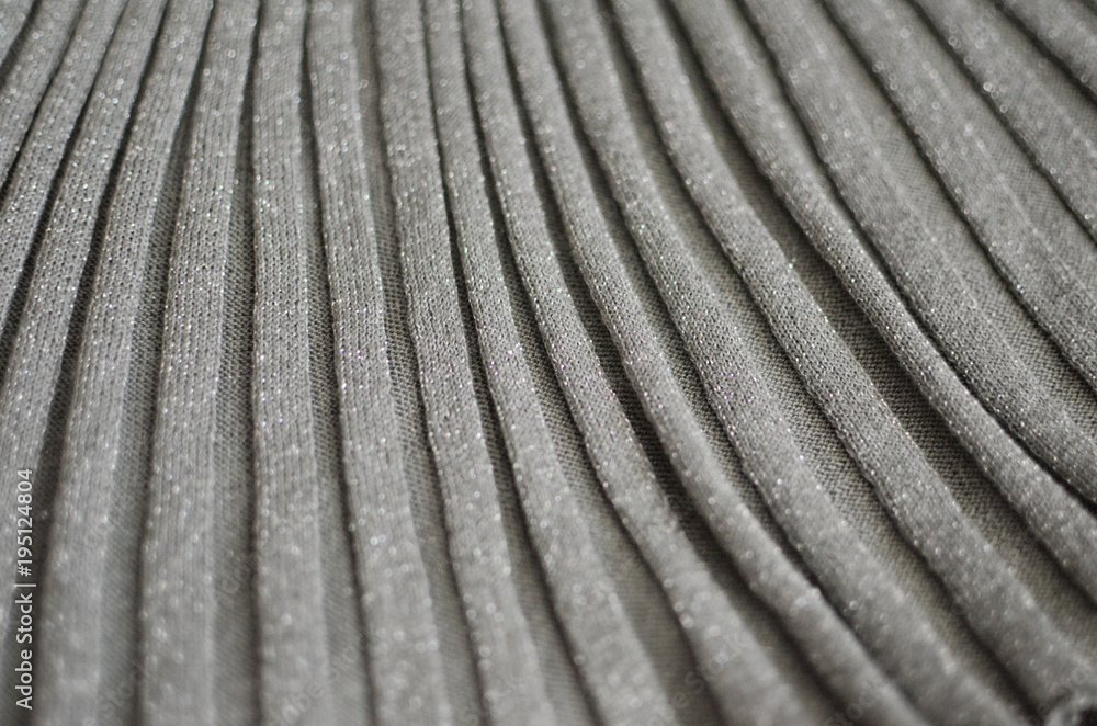 Cotton, warm, knitted gray fabric for tailoring. Closed background. Cotton, warm, knitted gray fabric for tailoring. Closed background.