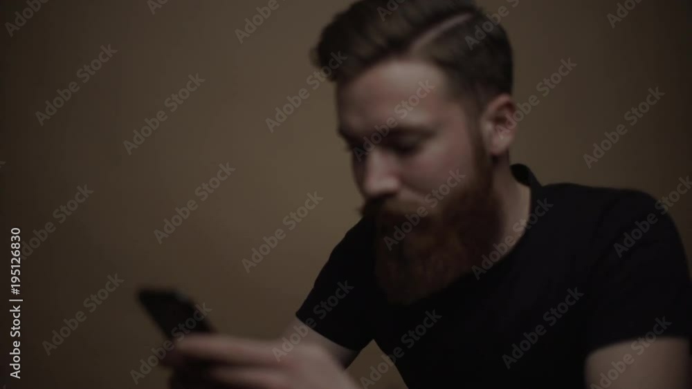 young hipster working with his electronic device young hipster working with his electronic device