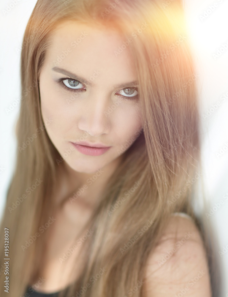 Naklejka premium closeup. face of a beautiful girl with long hair