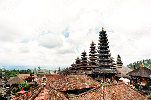 Traditional balinese roofs in Pura Penataran Agung Besakih complex, the mother temple of Bali Island, Indonesia. Travel and architecture background