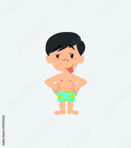 Asian boy in a swimsuit in waiting attitude with funny expression.