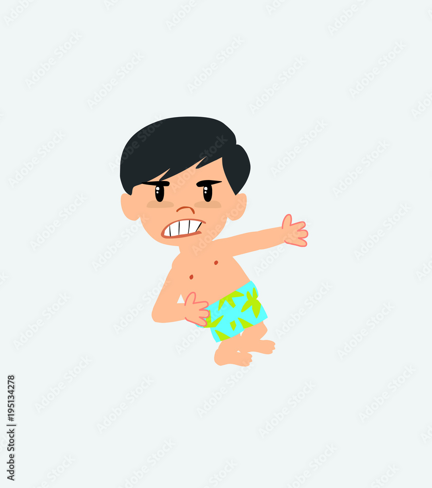 Asian boy in a swimsuit shows very angry something to his left. Asian boy in a swimsuit shows very angry something to his left.