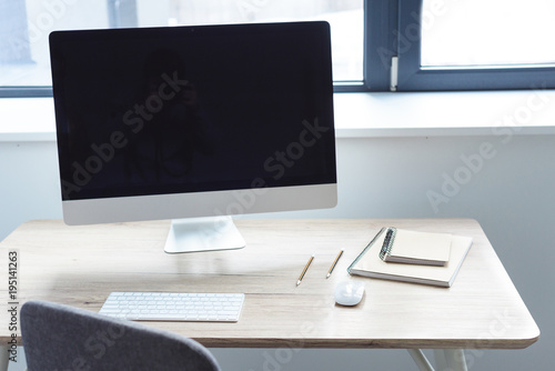 Computer with blank monitor on working table