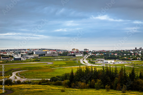 Icelandic capital panorama, streets and resedential buildings with fjord and mountains in the background, Reykjavik, Iceland