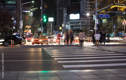 Photography People Crossing the Street at Night in Seoul, Korea