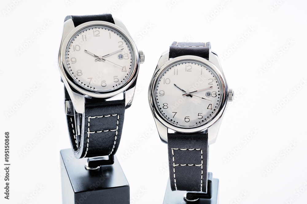 Two classic watches and support isolated on white Two classic watches and support isolated on white