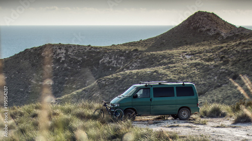 Small camper parked in a scenic location