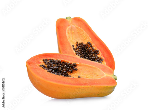 half of ripe papaya fruit with seeds isolated on white background