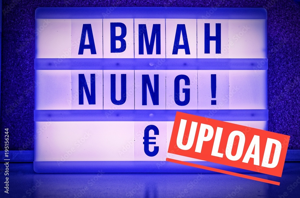 Leuchttafel mit der Aufschrift Abmahnung auf englisch written warning