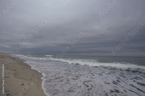 Canvas Print Storm on the see with  waves on the sand beach