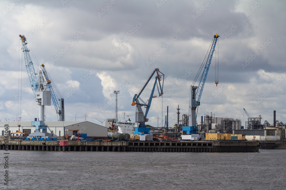Containers, docks and cranes in the port of hamburg