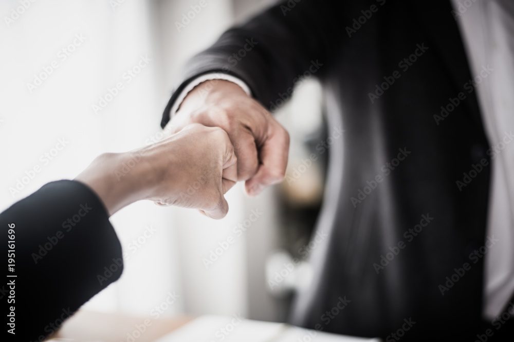 Fototapeta premium Business people showing Fist Bump after meeting partnership. Teamwork Concept.