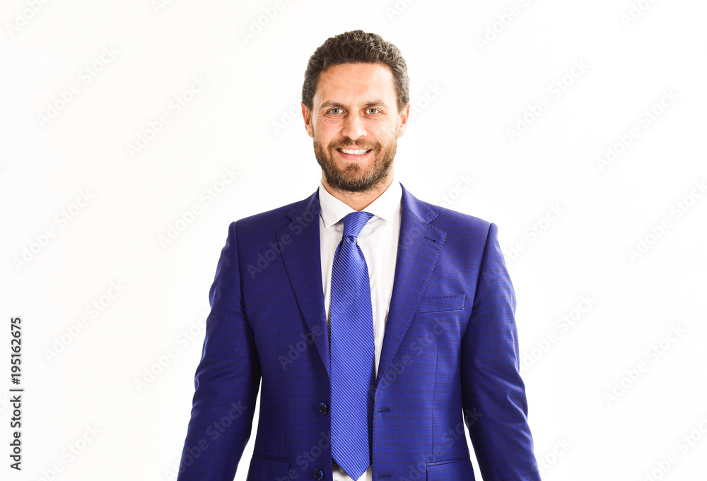 Businessman with smiling face wears classic suit and tie. Businessman with smiling face wears classic suit and tie.