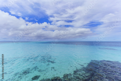 Crystal clear turquoise sea in a beautiful day in tropical Maldives island
