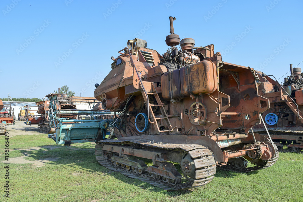 Old rusty disassembled combine harvester. Old rusty disassembled combine harvester.