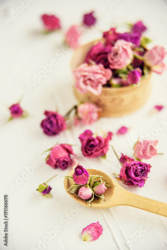 Dried rose petals: for tea, alternative medicine, pot-pourri. Copy space.