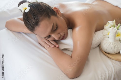 Beautiful young woman in spa salon massage  relax and healthy.
