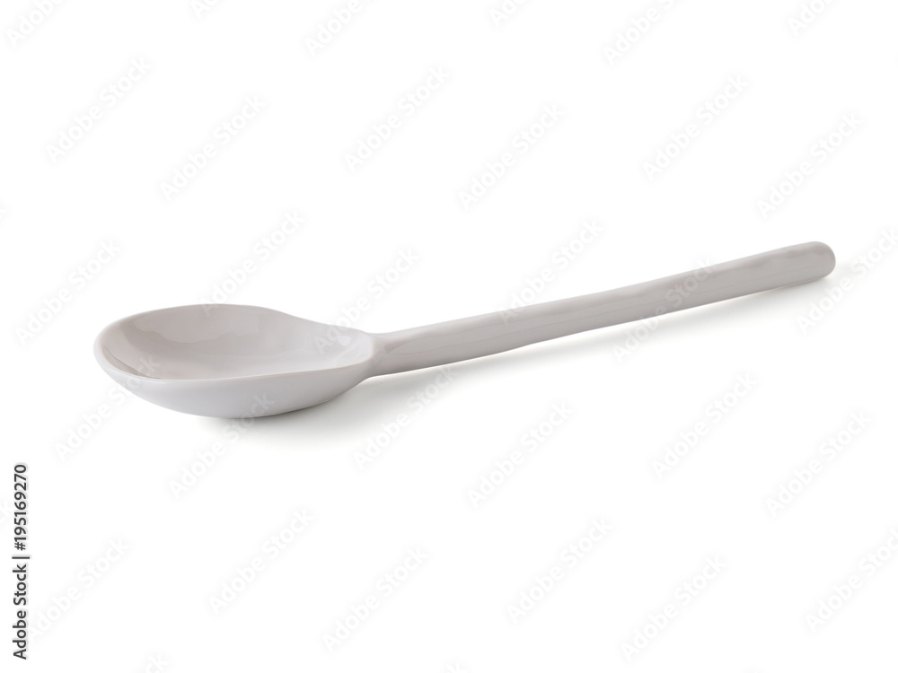 modern ceramic spoon (beautiful shape) on white background