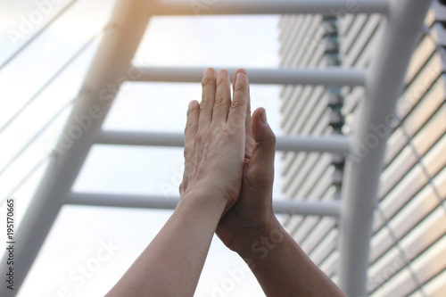 Meeting teamwork concept,Friendship,Two hands showing unity on white background