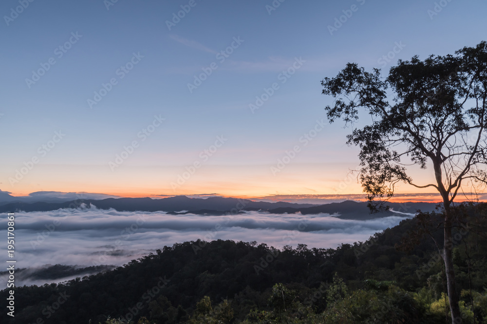 Landscape of Morning Mist with Mountain Layer at Mae Yom National Park, Phrae province.