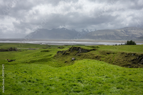 Green meadows in Stafafell area in Iceland photo