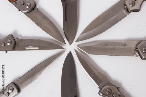 folding blade knife somewhat pointed outwards in eight pieces