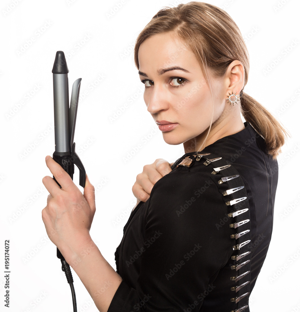 Female professional hairdresser with ploy. Elegant woman presents her hairdresser's accessories. Hair styling and beauty concept