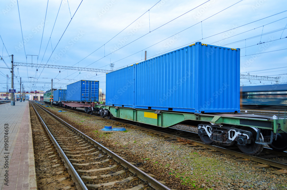 Transportation of cargoes by rail in containers. Railway infrastructure background Transportation of cargoes by rail in containers. Railway infrastructure background