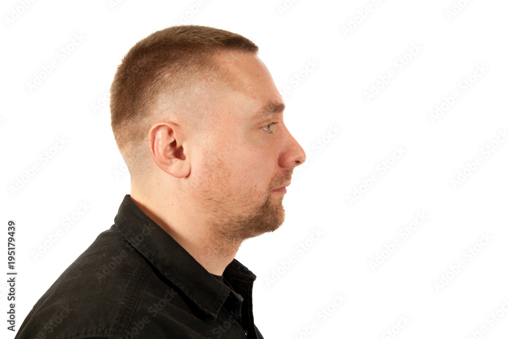 Portrait of the young unshaven man in profile Portrait of the young unshaven man in profile