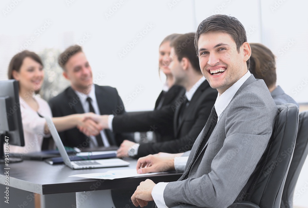 lawyer on the background of business partners handshaking lawyer on the background of business partners handshaking