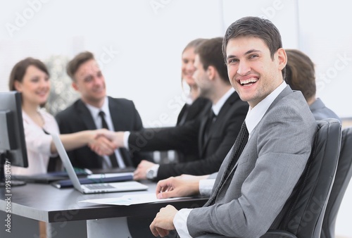 lawyer on the background of business partners handshaking