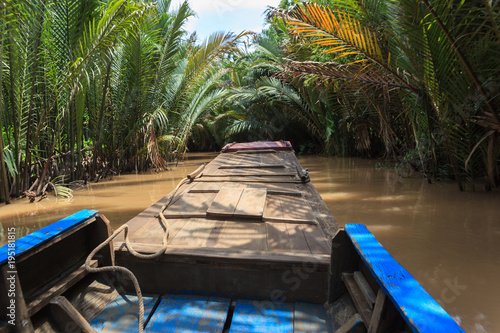 Boating on a dirty river Mekong Delta  Vietnam