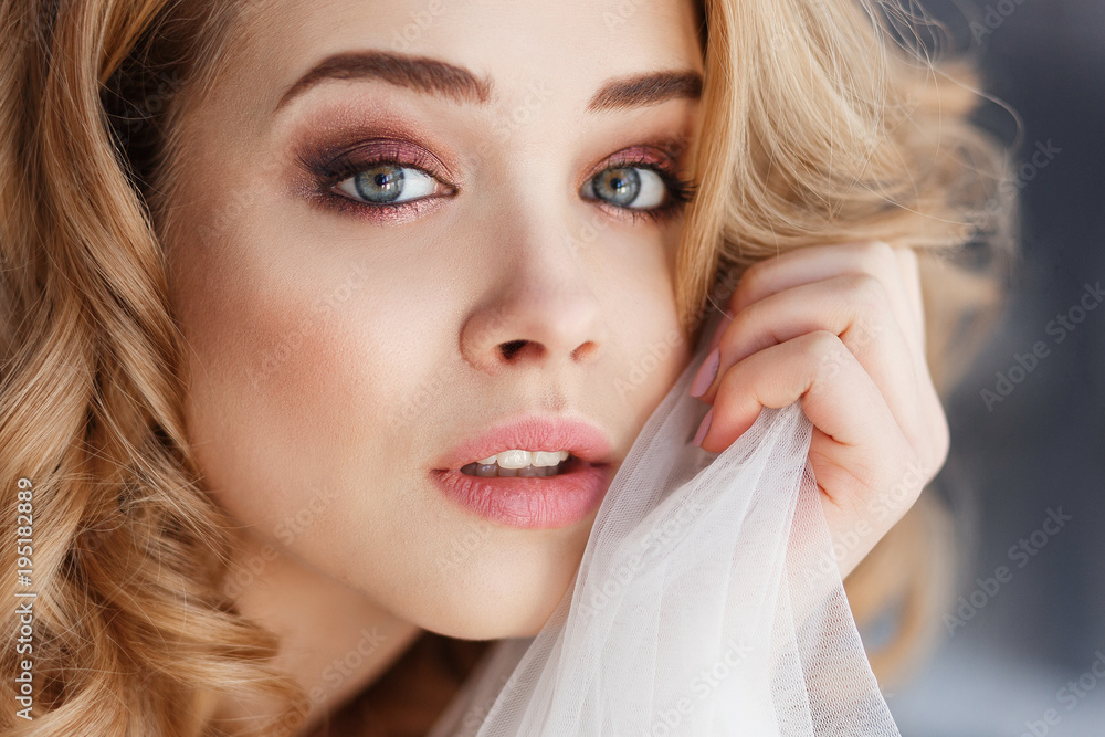Portrait of sexy caucasian tender young woman with beautiful gray eyes. Close-up horizontal shot
